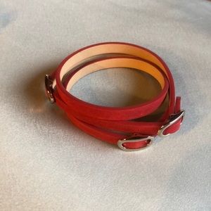 Red leather bracelet with silver buckles